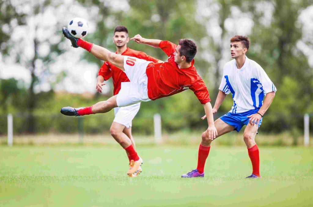 A footballer who catches a ball