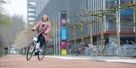 a woman on a special developed bike with steerassist